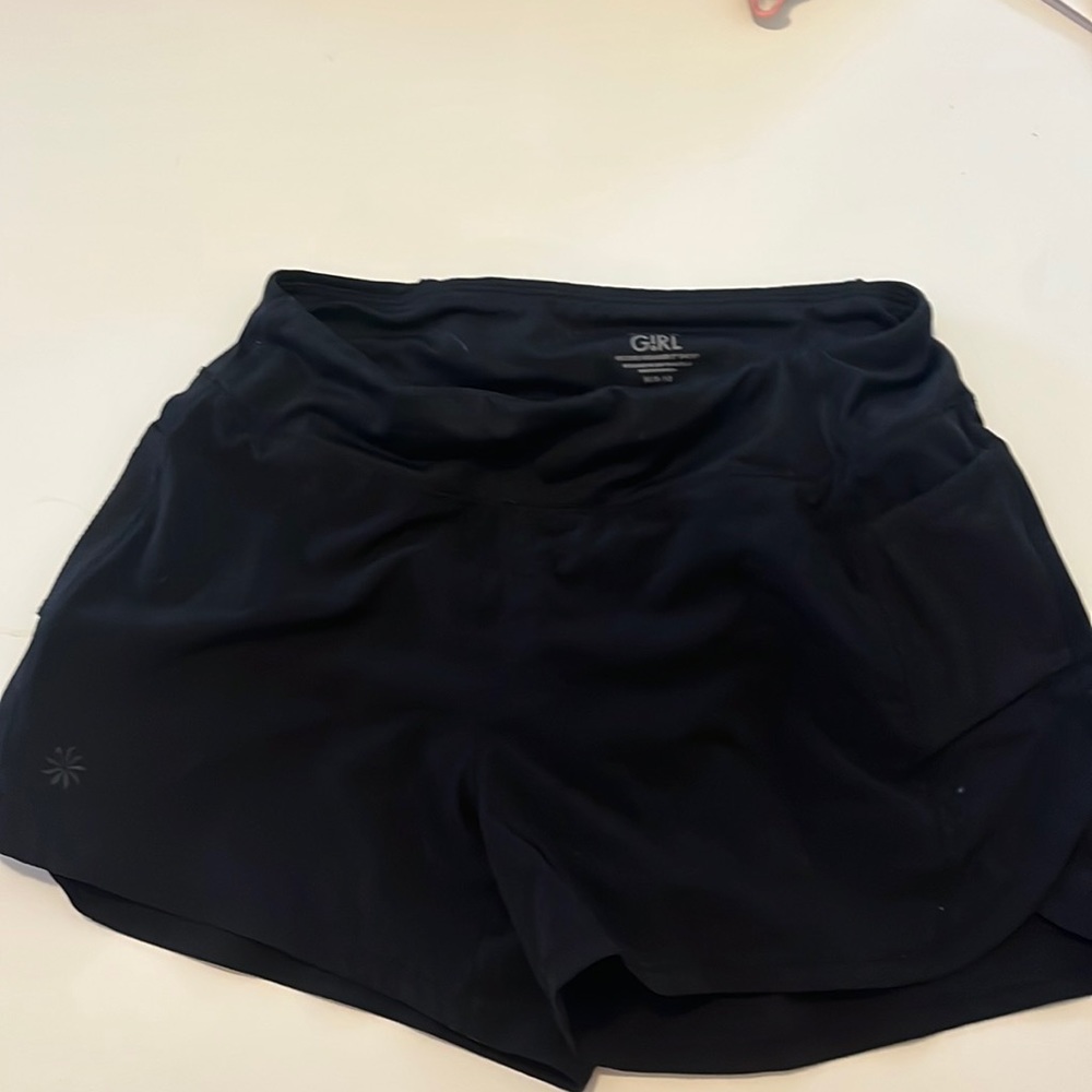 Black barely worn nylon athletic shorts.